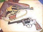 Two S&W 2nd Model, Hand Ejector, .455''s
One is British or Canadian military, the other "civilian", or possibly police.