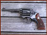 S&W model 10-5, with 5" slim barrel. 2nd photo via Paint Shop Pro.