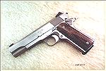 "pre-Loaded" Springfield 1911-A1, tastefully tweaked.