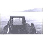 In a landing craft, standing off the coast of the Mull of Kintyre, Scotland.