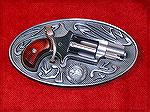 Here''s another toy, a belt buckle revolver, that I always wanted, but they disappeared from the market.  I found a guy at a gunshow that had several of them NIB, now he has one less!