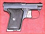 This is a pretty neat little DAO French pocket pistol in 6.35mm.  It actually looks like it would be a reasonably reliable gun, and the tip-up barrel makes it easy to load.Le Francais 6.35John Will