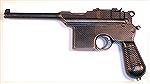 Astra 900.  This is a Spanish copy of the Mauser Broomhandle, but totally different internally.  It is simplified from the Mauser, and has a removable side plate that makes cleaning and fixing the gun