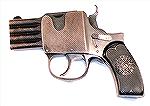 This is the unusual Reform .25ACP pistol.  Four rounds are loaded into the removable barrels and the barrel assembly is seated in the frame.  The action is DA/SA, it can be cocked or just fired DA.  W