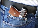 Raven .25 Auto in jeans pocket holster.Pocket holster.Bill Adair