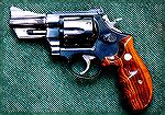 This is the Lew Horton version of the S&W Model 24 in .44 Special, 3-inch barrel.  A special run some time around 1985.  I've seen them in SS and Blue.  This is a deep, rich blue, even though it doesn