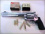 S&W Model 500 with a box of Hornady 350gr XTP JHP's. (1900fps). Note the "small" cartridge put in for scale, which is a .44 Mag.