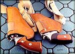 Safariland upside down shoulder holster for 4" medium frame and 2" small frame revolvers.  These are the only shoulder holsters I ever liked.