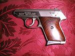 Walther TPH in 22 rimfire.
Eagle Rosewood grips 