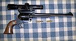 Ruger Blackhawk rebuilt to 218 Bee, with 10" barrel and Leupold scope, Gets 2100 fps with 45 gr JHP bullet from factory ammo
Bisley hammer added for ease of cocking under the scope tube, Bisley trigg