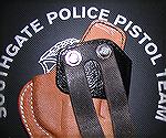 The Sparks Summer Special II holster for my SIG P239, showing the mode of attachment of the dual belt loops.  This precludes them swivelling to different pistol orientations (vertical, FBI rake, etc.)