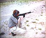 My son when he was in high school, shooting on my club range after a three gun match (in which he did very well).