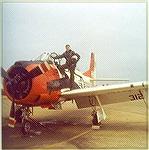 Dale Mullin climbing into a trusty &quot;Tango Two Eight, Fighter/Interceptor&quot; for a training flight.  Timeframe is late 1970 or early 1971.