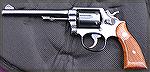 Stock S&W Model 10-5, with 6" barrel. Made in 1969/70, and bought used in 2001. Very accurate, and a typical S&W silk smooth trigger.