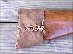 A leather stock boot that I made to cover a recoil pad.