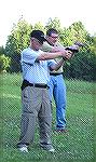 Bob and Mark shoot it out on a dueling tree!