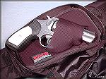 Bianchi Model 4411 fanny pack shown holding a Ruger 9mm.