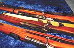 Three military rifles, top to bottom: Mosin-Nagant, M1917 &quot;Enfield&quot;, M96 Mauser.