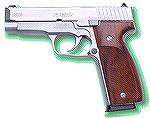The biggest of the Kahr line.  All stainless,  Either 9mm or .40 S&W -- this one is a 9mm.  Hogue wood grips.  4" barrel.