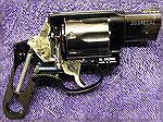 This is my Taurus 817 alloy-framed .38 Special revolver with the side-plate removed to show the inside bits.  The hammer has been bobbed, removing the spur for better concealed carry.
