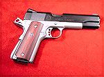 Here's a two-tone springfield 1911.  I sent this one off to SM&A for their Tactical Carry Package, very nice gun.