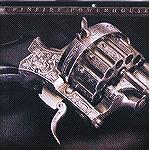 Image uploaded from the USA Shooting Team 2005 Calendar.  Image shows a Pinfire Powerhouse. "Elaborately engraved and fitted with smooth ebony grip pamels, this embellished handgun has two barrels to 