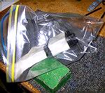 I assembled the pivot pin inside a plastic bag because I'd heard scary stories about losing the spring and/or detent