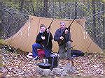 My son and me pictured in front of our Whelen Lean-to during a late October camping trip in the mountains of Virginia.  My son's rifle is a standard Ruger 77/22 with Leupold Compact 3-9 AO scope.  My 