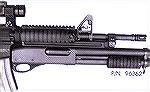 An AR15 with a Rem 870 mounted under the forend. This is an interesting combination that does work, albeit in a very heavy package. The US army has been experimenting with a similar setup using a box 