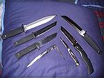 Left side counter clockwise; Peace Marker I, Kobun, Master Hunter, Muskrat, Bird Knife, Extra Large Voyager, Tanto.