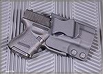 Comp-Tac holster with Glock 27 pistol.  This is an extremely concealable yet powerful package.