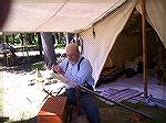 cutting the cheekpiece on a muzzle loader in the woods