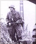 Here's a German soldier carrying an M-1 Carbine.