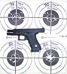 Factory stock Glock 22 with Glock night sights, fired at Black Wing Shooting Center on 11-26-06. Blazer 180gr .40SW ammo. Using the factory night sights, one can see they are not precise enough for ta
