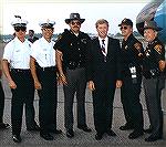 Uniform protection detail for VP Dan Quayle. The US Secret Service prefers good shooters on a protection detail. A younger, thinner forum member Jerry Webb is on left. Note the huge low tech walkie ta