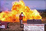 Tom Knapp rapidly oxidizing a gallon of gas in a plastic jug with his show's final shot.