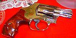 According to this gun's owner*, a friend of mine, S&W made 300 nickel Model 36 revolvers with rosewood grips and 1 7/8" barrels. This is one of them, in .38 Special, +P rated.
* 12/09/10 Sadly, Jim i