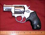Here is a Taurus 905 model 9MM revolver. This was taken the same day after it magically came home with me.