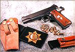 When I actually carried that badge I also carried the Colt .45 in the photo.  Series 70 with Novak sights and Mustang grips inlaid by Rocky Kemp.  Milt Sparks Summer Special IWB holster, Davis mag car