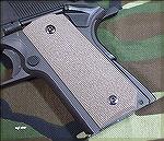 Hard rubber version of Ergo Grips 1911 stock panels.  They are extremely comfortable--not sharp, but also not squishy like Hogues or Pachmayrs.  Shown mounted on Springfield Compact, but these are als