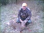 Well, 
I was finally successful with this deer. Picture was taken with a camera phone. Rifle used was a Remington 721 in .30'06. Ammo used was a Remington Corelokt 150 grain JSP. 