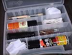 I put together this pistol cleaning kit for my shooting bag.  It has all the essentials and no fluff.  I use aerosol versions of Hoppe's #9 (cleaning) and Shooter's Choice FP-10 (lubricating), but any