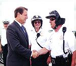 Here a non-shooter meets a real straight shooter during the 2000 presidential campaign. Jerry is bidding Al farewell at the airport.