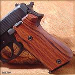 Hogue Pau Ferro grips--very lovely wood.