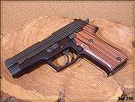 SIG P220 .45 with smooth Pau Ferro wood grips from Hogue.