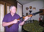 Me with my well-worn Valmet 412S.  I'm demonstrating my typical &quot;low gun&quot; stance when I'm awaiting the launch of a target.  The 26&quot; barrels appear a bit short for me.