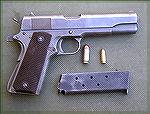 A very beautiful old GI .45.  Not sure what the 9mm round is doing in the photo next to the .45 round....