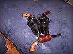 Here are two of my main match pistols for Cowboy Action Shooting, along with my spare. 

The two pictured here are 1895 Nagant Revolvers in custom made holsters. The other is a Ruger Blackhawk Conve