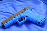 Simunition-firing practice pistol chambered in 9mmFX.  From the Ken Lunde Pistol wallpaper pages.