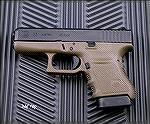 Glock Model 36 6+1 .45ACP pistol.  Ugly green polymer frame.